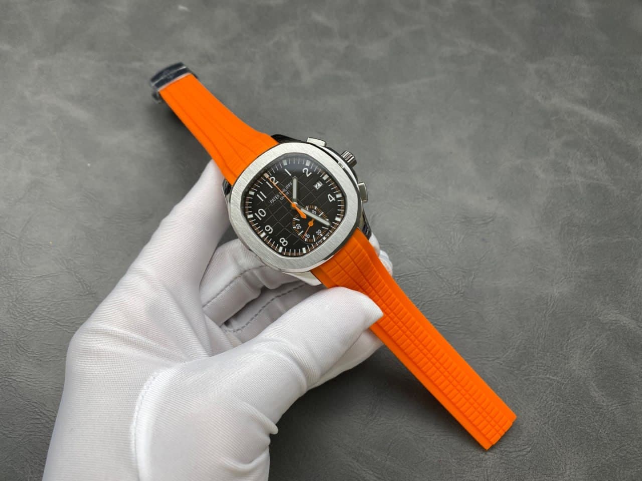 Patek Philippe Aquanaut Chronograph–Style Watch – Black Dial & Orange Strap